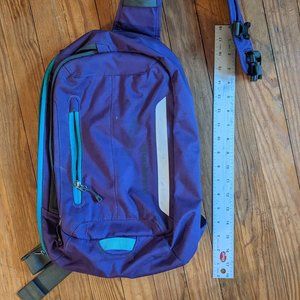 Patagonia sling backpack in purple/teal